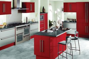 Modern kitchen design with striking red cabinets and trim